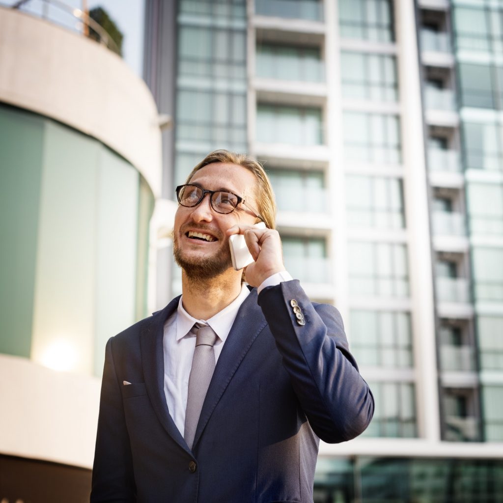 Business Man Outdoors Phone Call Concept